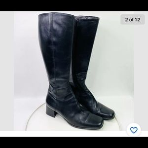 Black Italian Leather Boots worn to the knee.